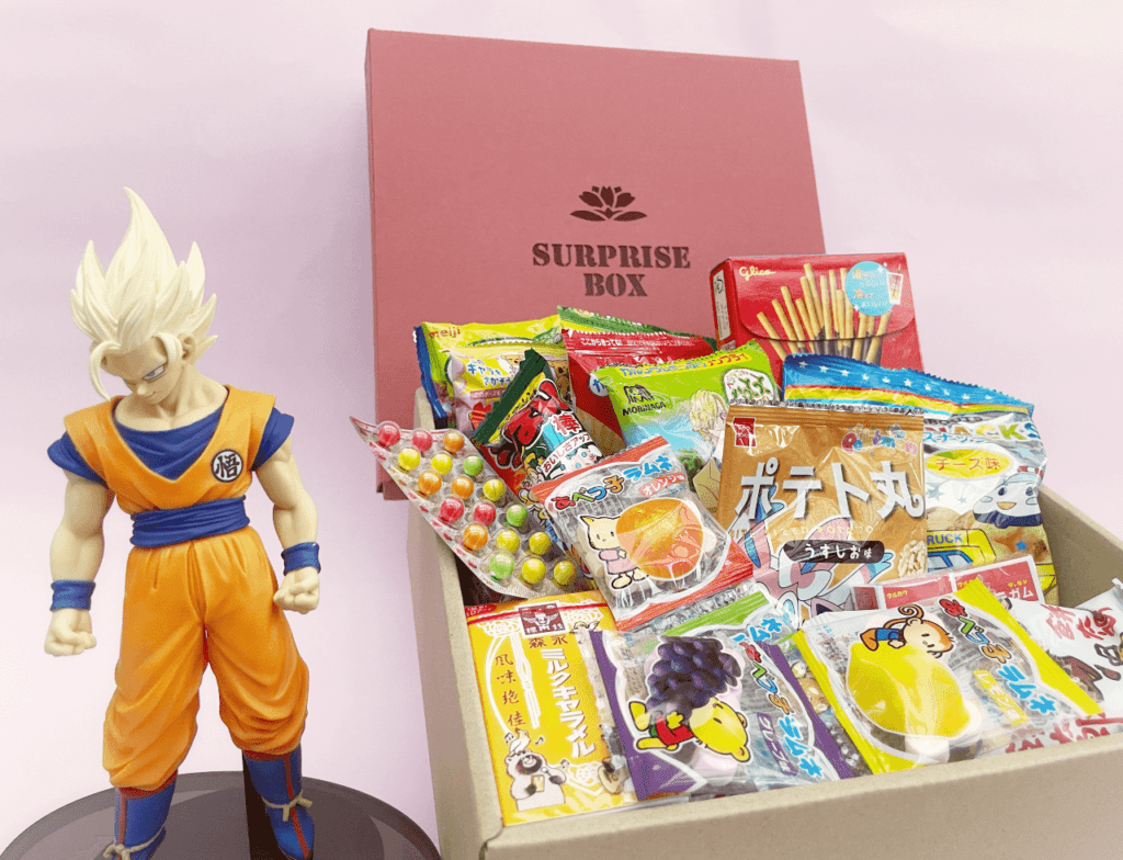 Okashi Box + Figura de Acción