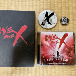 75165  We are X SPE DVD + Soundtrack + 2 Retro Pin Badges