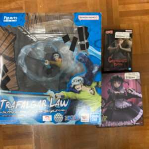 Large blue box for Trafalgar Law figure (One Piece) with window display and two smaller boxes on the right side.