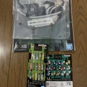Large collectible poster featuring Hiromi Higuruma from Jujutsu Kaisen lying in a clawfoot bathtub, with bundled merchandising items in front and bottom corner packaging showing Bandai Namco logos. Includes two smaller accessory sets (keychains/stickers) laid on a wooden floor.