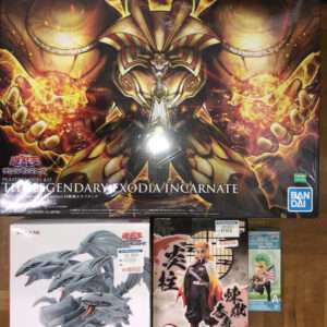 Large Bandai model kit box art showing a gold, flaming armored figure with outstretched hands, titled 'THE LEGENDARY XODIA INCARNATE'.