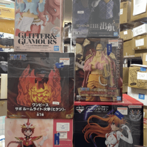 Stack of boxed anime figures on store shelves, featuring characters from One Piece, Dragon Ball, Evangelion, and more.