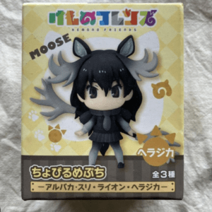 Chibi moose character from Kemono Friends in a yellow packaging box; black-haired girl with gray outfit and antlersVariant 1