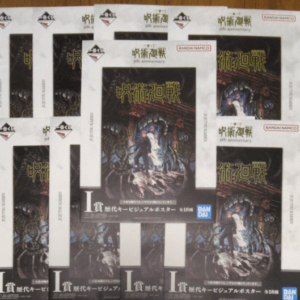 Stack of Bandai Namco 5th anniversary posters with Japanese text; central artwork shows a girl in white amid dark fantasy monsters.