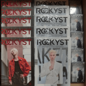 Shelf of ROCKYST product boxes arranged in rows, showing models in red and white outfits paired with the brand name ROCKYST.