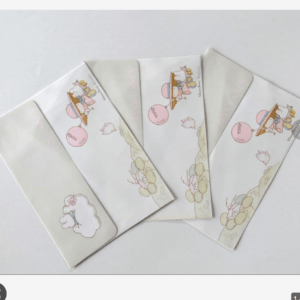 Five pale white envelopes with pastel cartoon illustrations of a girl and animals on a hill, fanned out. (Decorative stationery)