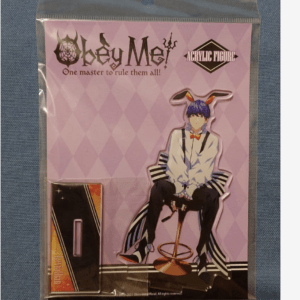 Obey Me! acrylic figure package showing a blue-haired character with bunny ears seated on a stool against a purple diamond-pattern background.