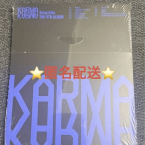 Sealed Stray Kids 4th album 'KARMA' packaging with large blue lettering on dark cover and red Japanese text '匿名配送'