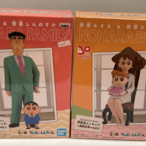 Two boxed Nohara Family figures: left shows a man in a green suit standing, right shows a woman sitting with a baby dressed in pink.