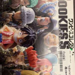 Boxed One Piece figure collection with multiple colorful character figurines in dynamic poses (Bandai logo visible).