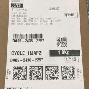 Shipping label with destination address in Tochigi, Japan, weight 1.0 kg, and multiple barcodes/QR codes for tracking.