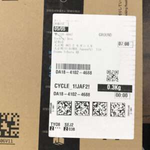 Shipping label on a brown box showing date 05/05, barcode DA18-4102-4688, weight 0.3 kg, service 'GROUND', and several QR codes.