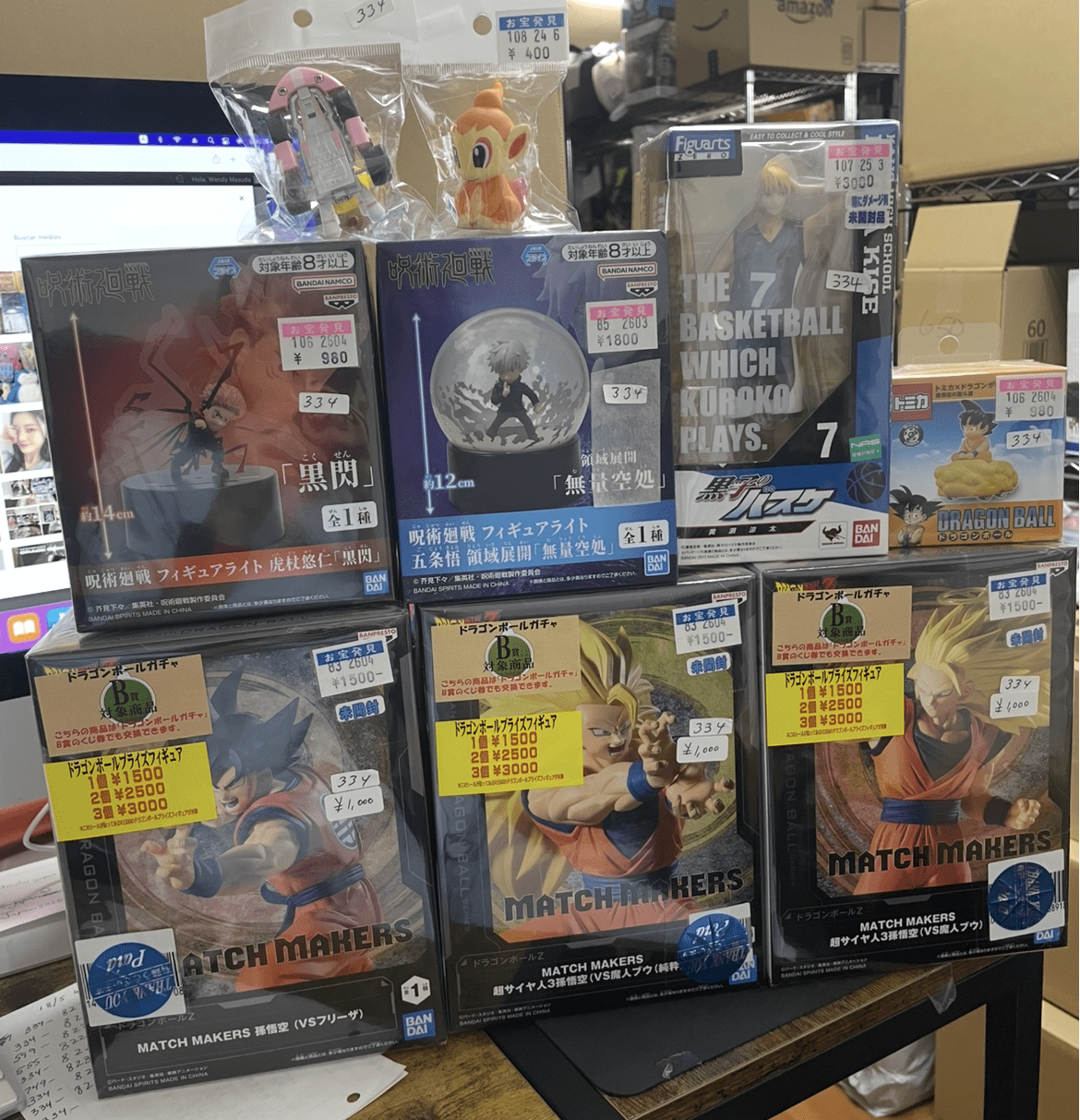 Ver Fotos Recientes 236 - Articulos Japan (post Box Japan) Display of boxed anime figures on a store shelf, including Dragon Ball and other character figures with price tags on the boxes. Articulos Japan (Post Box Japan)