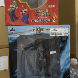 Boxed Super Mario Standard Figure 2 with Mario and Luigi visible through the window on a shelf, red box.