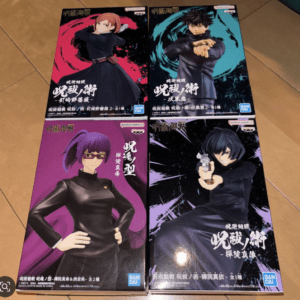 Set of four Bandai Namco Jujutsu Kaisen figurine boxes, each with a character in a dynamic pose against bright pink, teal, purple, or black backgrounds on a tiled floor.