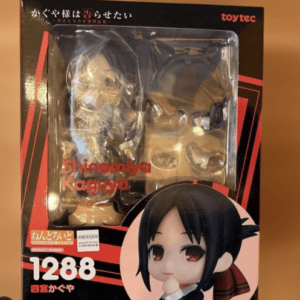 Boxed Shinomiya Kaguya Nendoroid figure with window packaging and accessories, red/black design visible on the box.