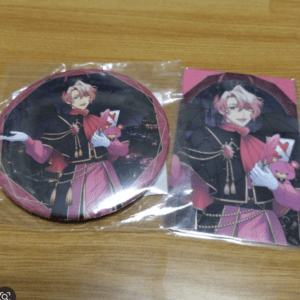 Round badge and a rectangular card, both showing a pink-haired prince in a black-pink outfit holding a pink bear.