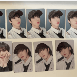 Set of nine photo cards showing a man in a dark cap and white shirt, arranged in two rows on a surface.