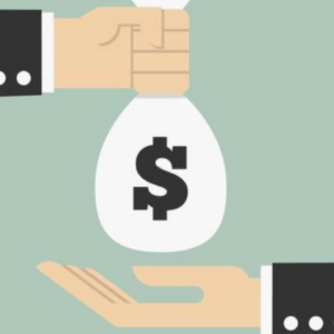 Two hands exchanging a white money bag with a dollar sign between them, symbolizing a payment or transfer of funds