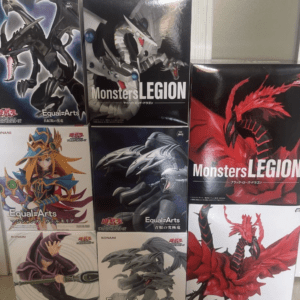 Stack of Yu-Gi-Oh! Monsters Legion Equal-Art boxes with dragon artwork on a shelf.