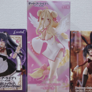 Three anime figure boxes on a shelf: left is a purple Coreful maid, center a pink BiCutePure angel, right a red bunny-girl figure from Fecha A Live.