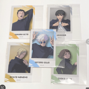 Five laminated Jujutsu Kaisen character cards laid on a white surface: Satoru Gojo (center), Suguru Geto, Kento Nanami, Shoko Ieiri, and Haibara shown in the others.