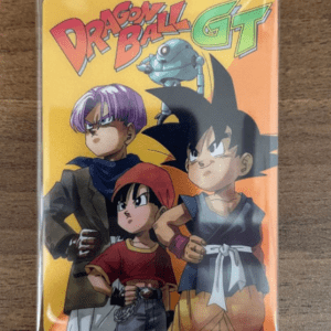 Plastic-packaged Dragon Ball GT collectible card featuring four characters against a yellow–orange gradient, with the Dragon Ball GT logo at the top inside a clear wrapper.