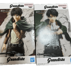 Two Grandista action figure boxes featuring a dark-haired male character with a green cape, placed side by side.
