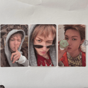 Triptych of a young man in a gray hoodie posing in three selfies: shushing gesture in panel 1, sunglasses worn in panel 2, and holding a light-green box near his face in panel 3.