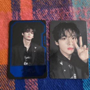 Two glossy portrait cards featuring a young man in a black suit on a colorful plaid background.
