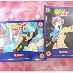 Two Dragon Ball GT DVD cases with characters in action poses on a pink patterned background.