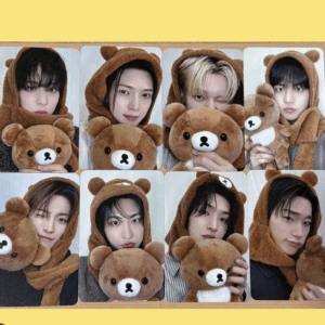 Collage of ten selfies of a person in a brown bear hoodie posing with a plush brown bear, in various playful poses.