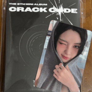 Album cover art with bold white text and a circular target design; a portrait photo of a girl in a gray hoodie rests on top.