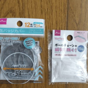 Left package: circular 54 mm badge cover set (12 pieces); right package: 15-piece ball-chain protection kit for lanyards.
