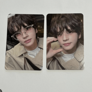 Two side-by-side photo cards of a young man with tousled dark hair in a beige trench coat; left card shows clear glasses, right card shows him touching his face at night.
