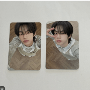 Two photos of a young man taken from above on a wooden floor; left image shows a neutral expression, right image shows a peace sign near the face.