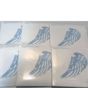 Six white compact mini album boxes with a blue wing graphic arranged on a light surface.
