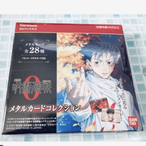 Front of a Jujutsu Kaisen metal card collection box by Bandai, showing an anime character reaching forward with red and black packaging.