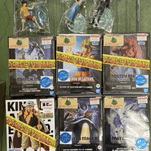 Shelf of collectible anime figures in plastic bags and boxed figures on a metal rack, including Dragon Ball characters and other franchises in packaging with labels and price stickers.