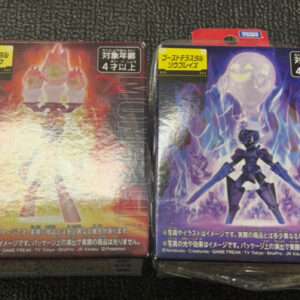 Two boxed collectible figures with fiery red/orange artwork on the left and icy blue/purple artwork on the right, placed on a black textured surface.  Articulos Japan (Post Box Japan)