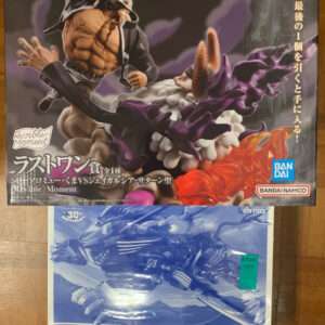 Boxed anime/figure set featuring a muscular character mid-action with purple energy, labeled Revive Moment Last One Prize (Japanese text).