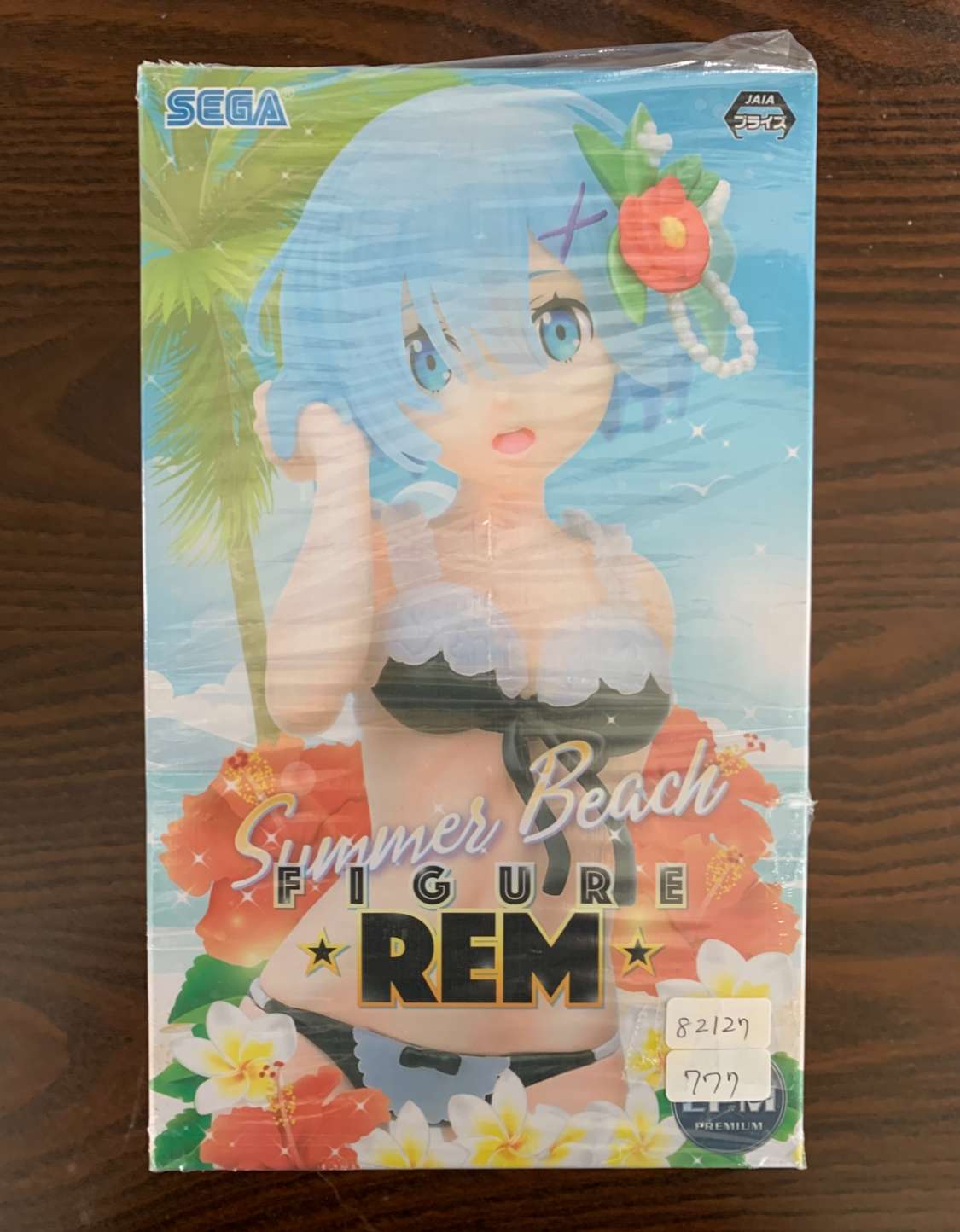 Img_2103 - Articulos Japan (post Box Japan) Box for a Summer Beach figure of REM by Sega, featuring a blue-haired anime girl in a bikini with hibiscus and tropical background Articulos Japan (Post Box Japan)