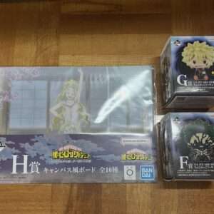 My Hero Academia prize set: large H賞 canvas board in plastic, featuring a waving character, with two chibi figure boxes (G賞 and F賞) beside it.