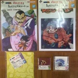 Two large Dragon Ball EX visual sheets: left shows Goku and a muscular mentor reaching forward, right shows a red space capsule scene with characters inside Knight-like pose.