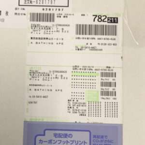Vertical stack of Japanese shipping labels with barcodes and the text 'A BATHING APE', showing tracking numbers and addresses.