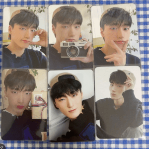 Six portrait photo cards of a young man in a black sweater and beige cap, arranged on a blue checkered surface, each showing a different pose.