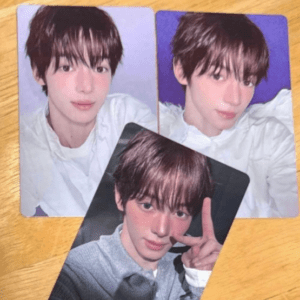 Three photo cards of a young man taking selfies; two show him in a white shirt with purple backgrounds, one shows him in a gray sweater making a peace sign.