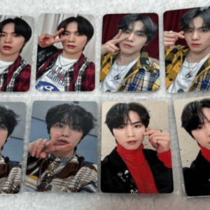 Eight photo stickers of a young man with black hair making a peace sign in each image, wearing different outfits.