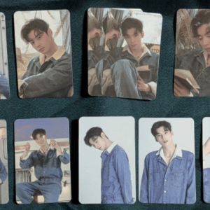 A collage of young man in denim outfits posing in various photos, laid out on a dark surface.
