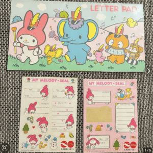 Colorful children's letter pad with cartoon animals and the title 'LETTER PAD'.